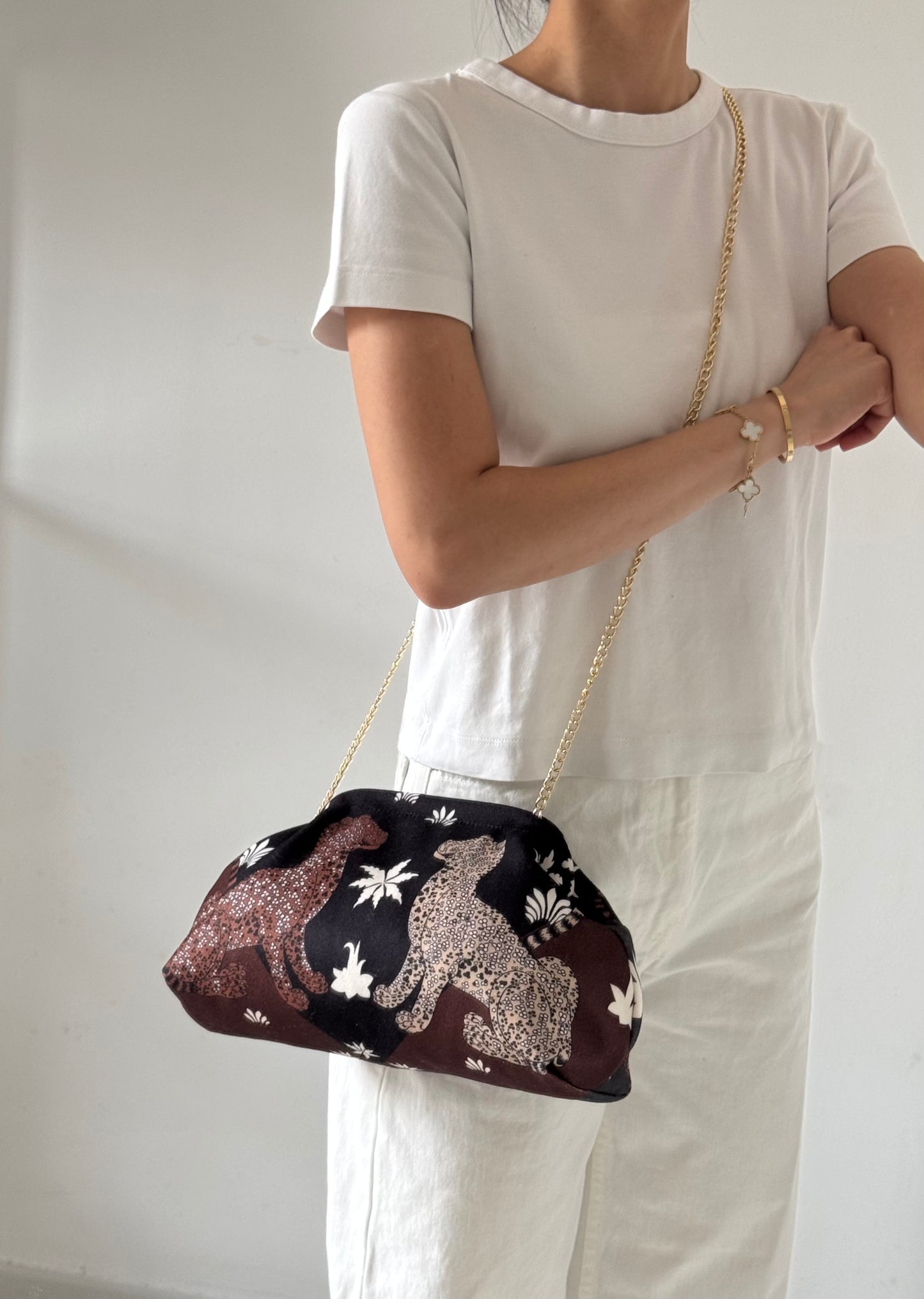 pochette Sicilia - stampa leopardi, con tracolla in catena