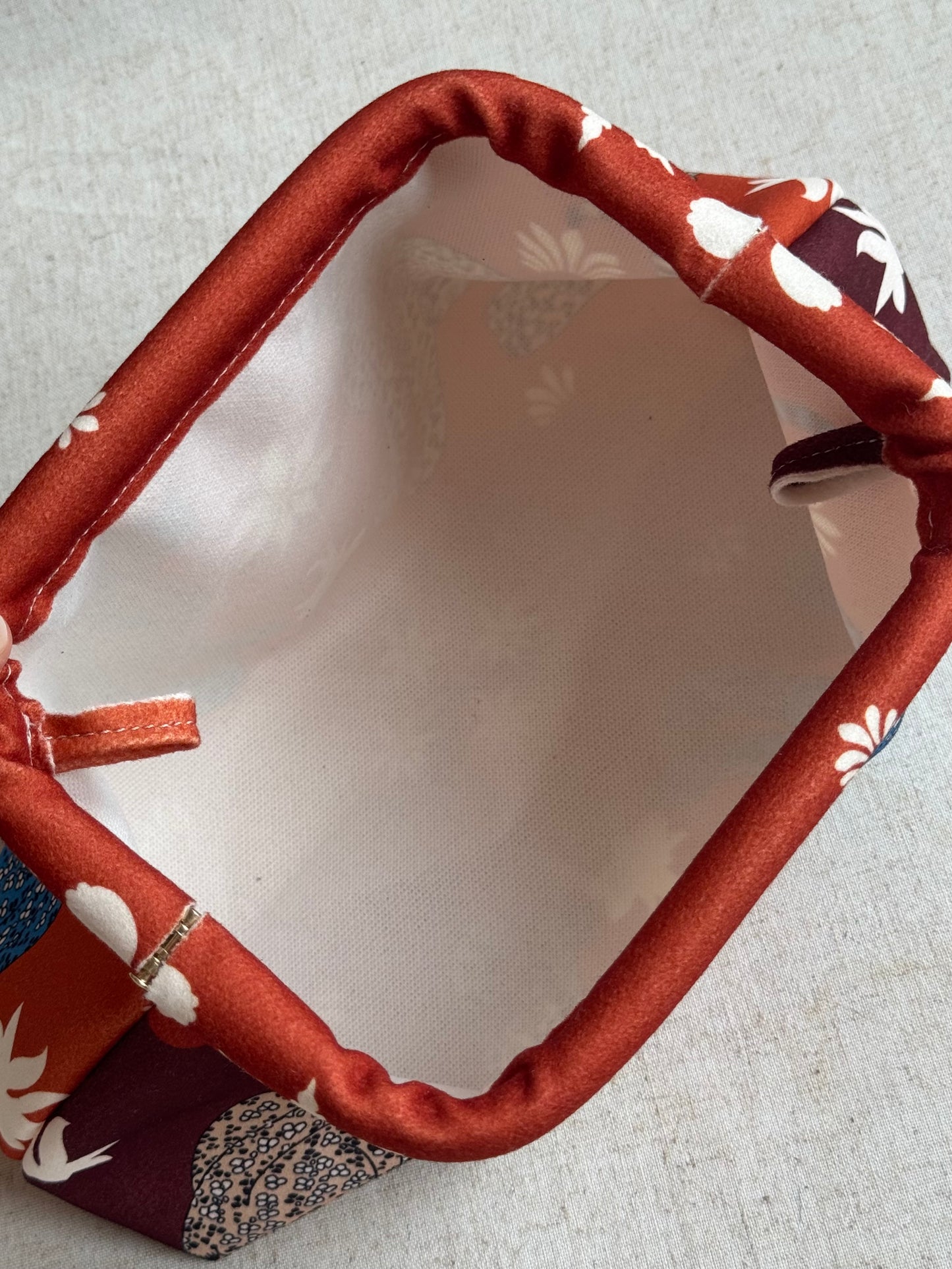 pochette Sicilia - stampa leopardi, con tracolla in catena