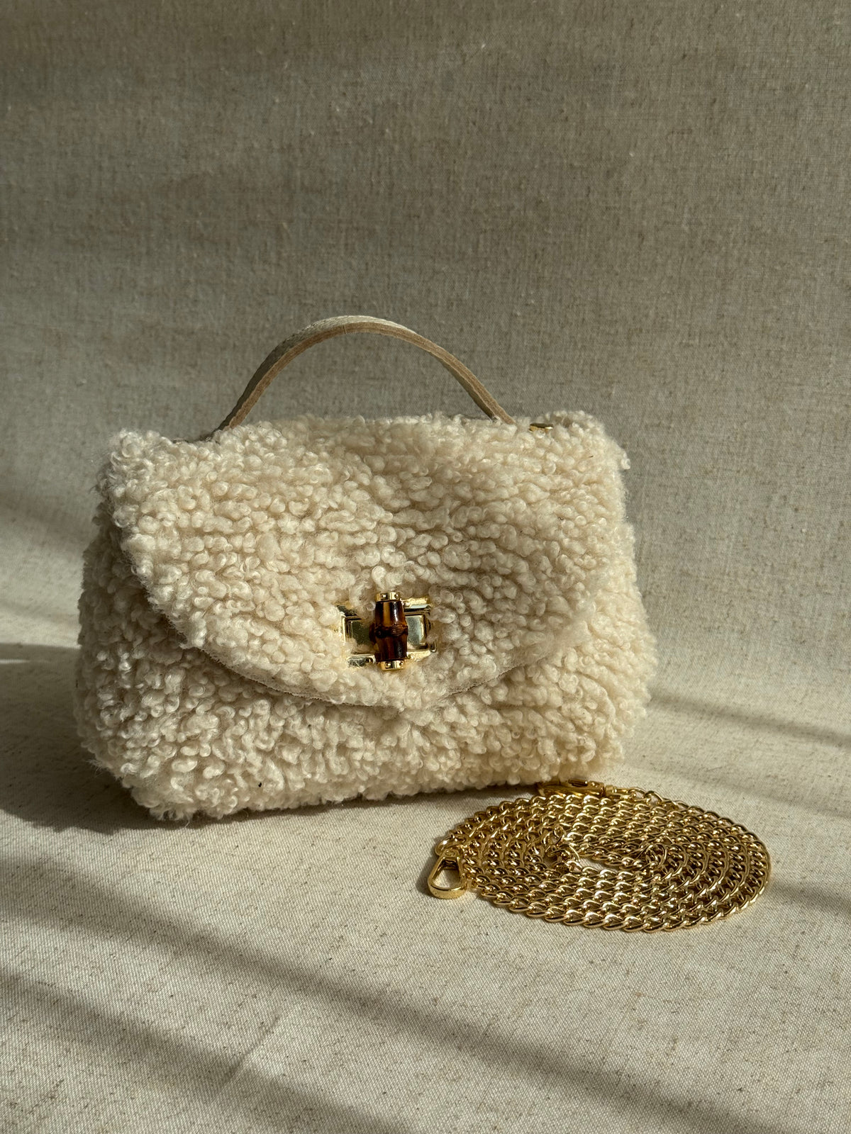 Borsa Lily - teddy, con tracolla in catena