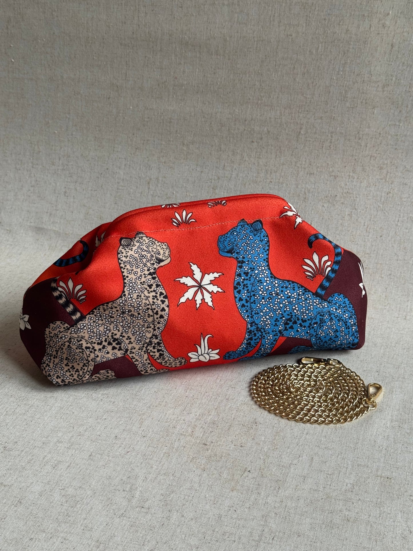 pochette Sicilia - stampa leopardi, con tracolla in catena