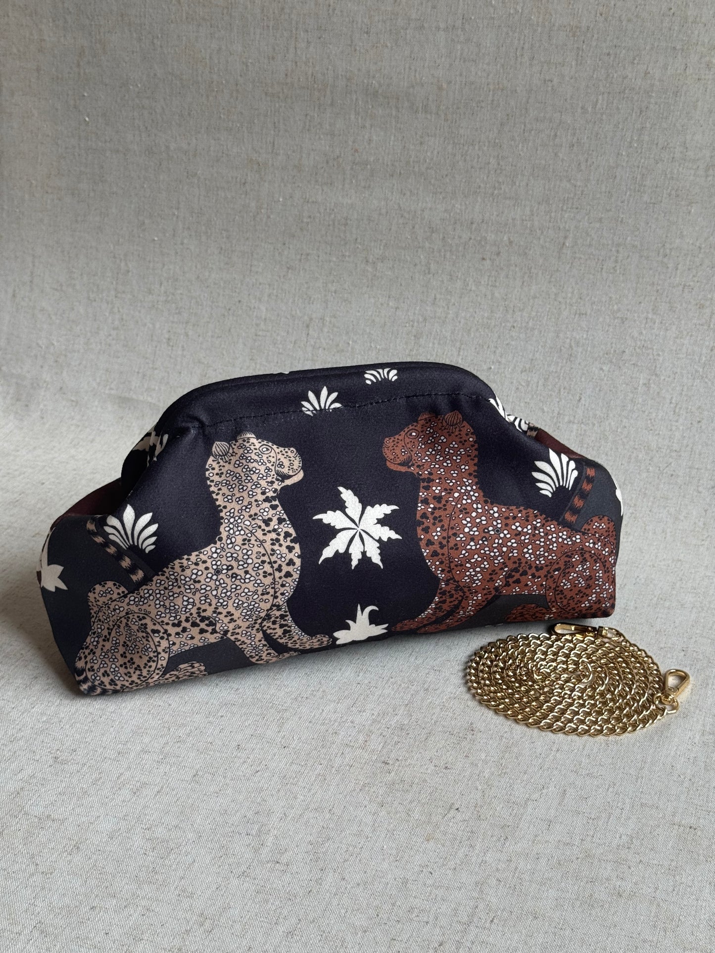 pochette Sicilia - stampa leopardi, con tracolla in catena