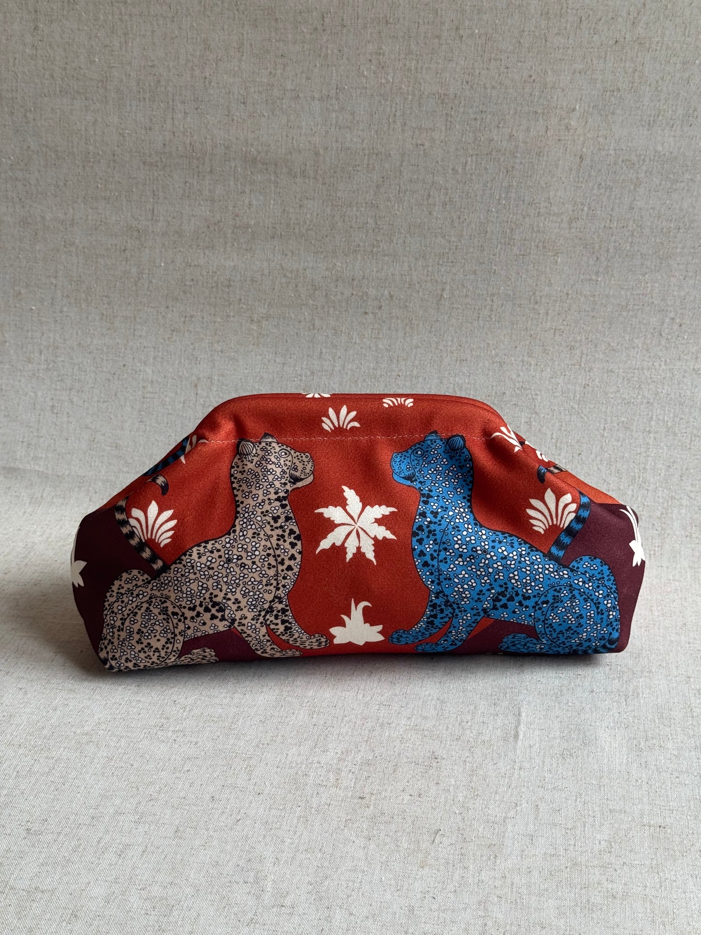 pochette Sicilia - stampa leopardi, con tracolla in catena