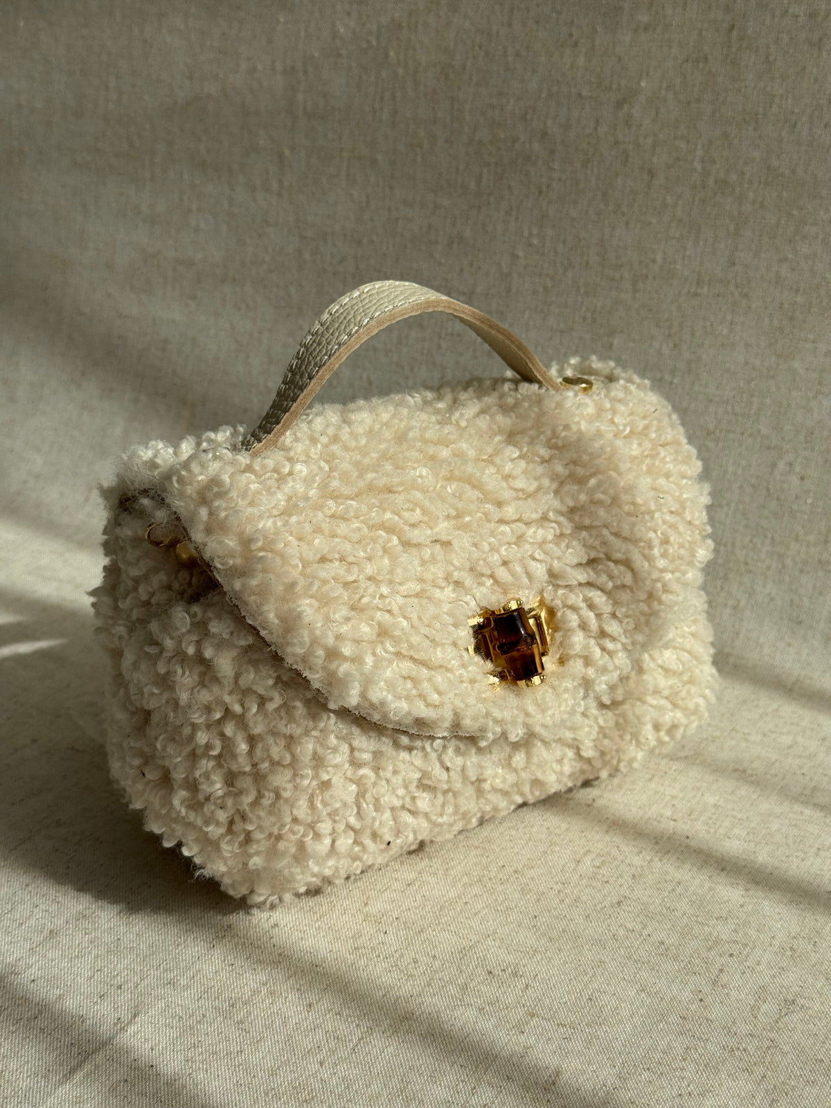 Borsa Lily - teddy, con tracolla in catena