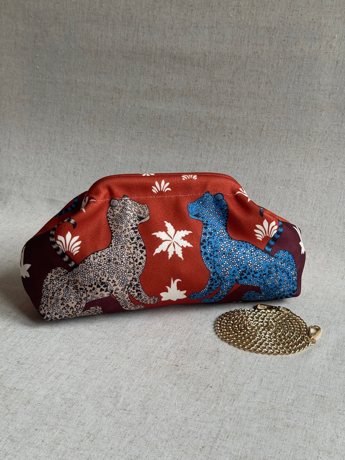 pochette Sicilia - stampa leopardi, con tracolla in catena
