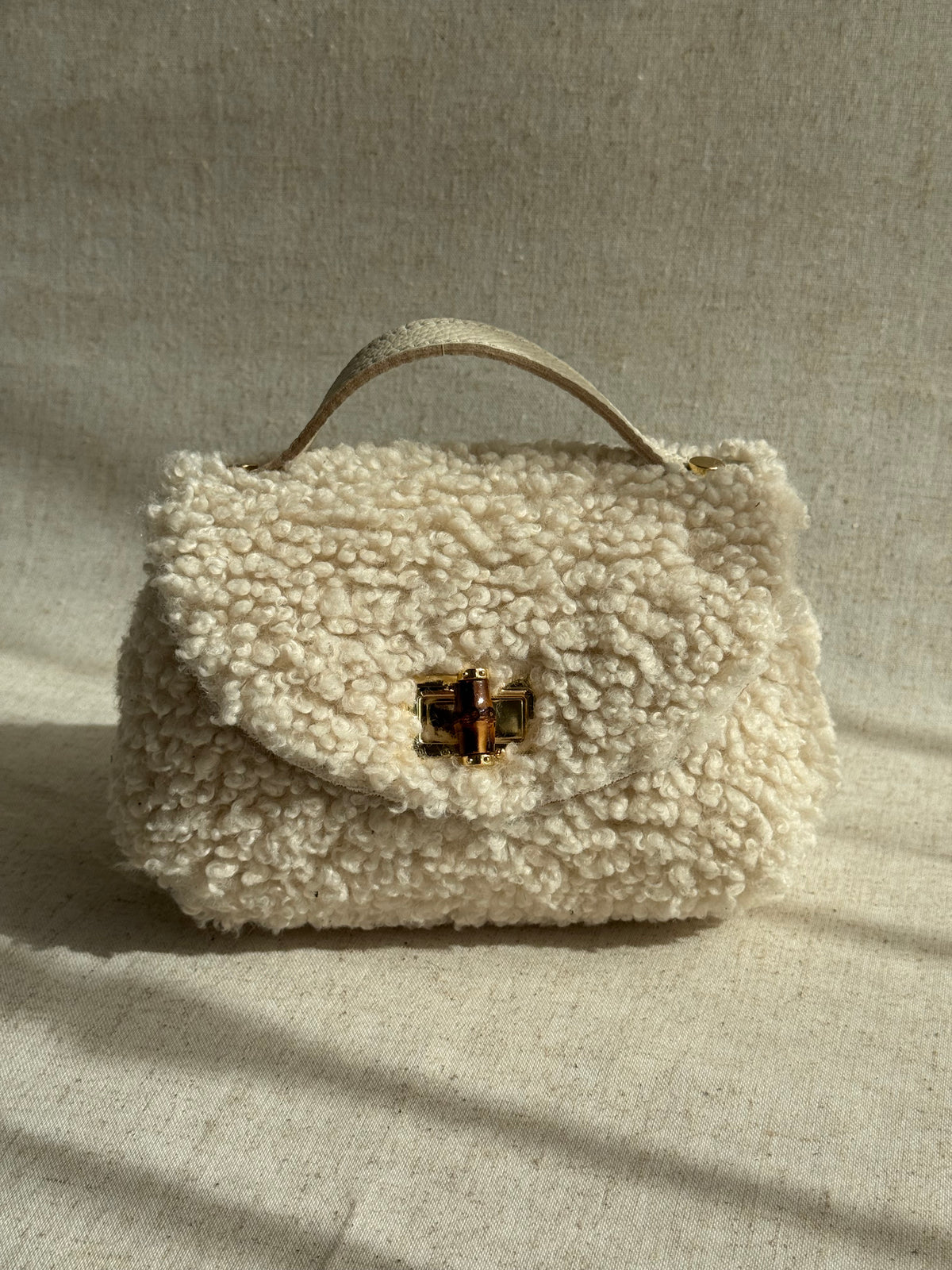 Borsa Lily - teddy, con tracolla in catena