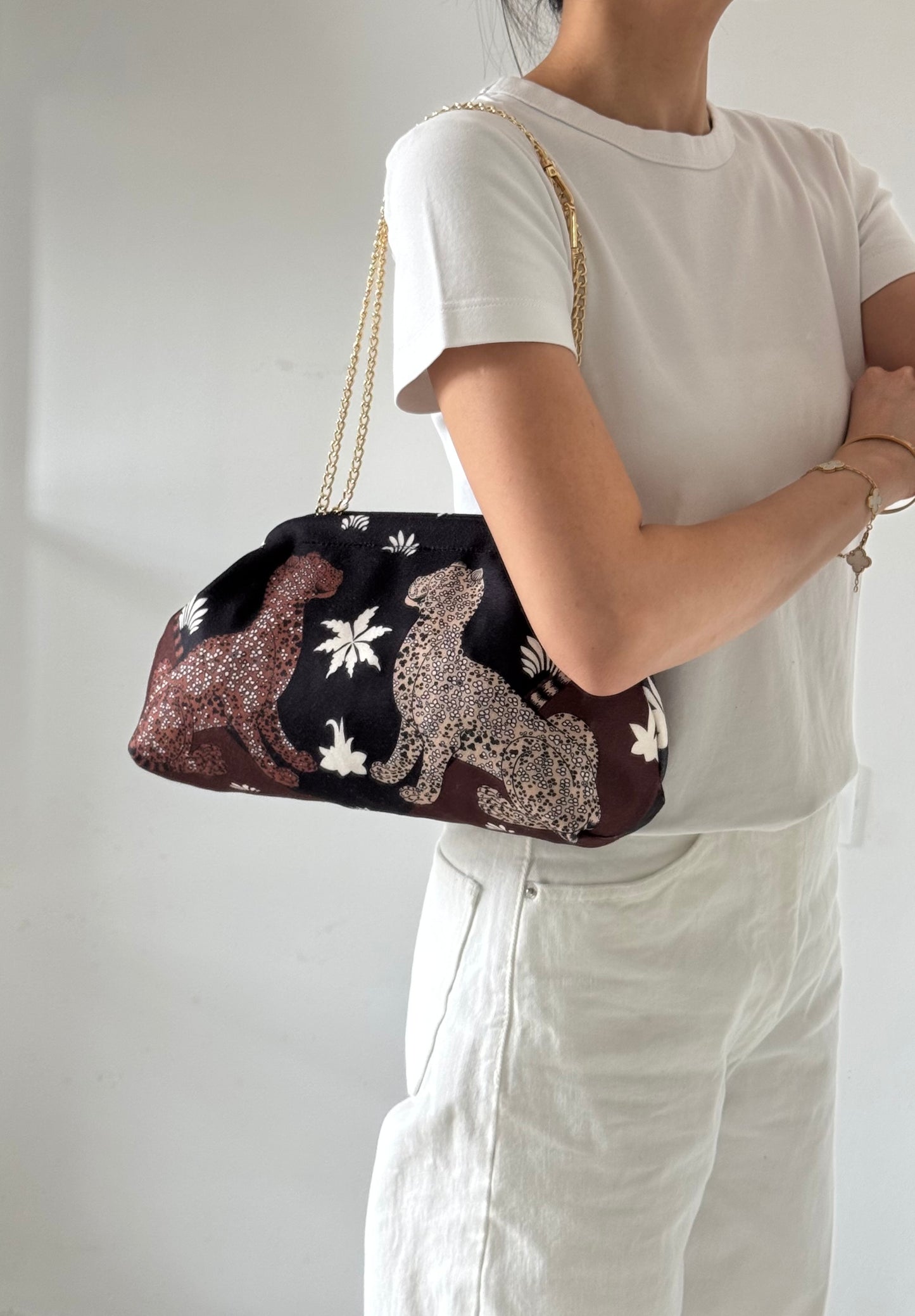 pochette Sicilia - stampa leopardi, con tracolla in catena