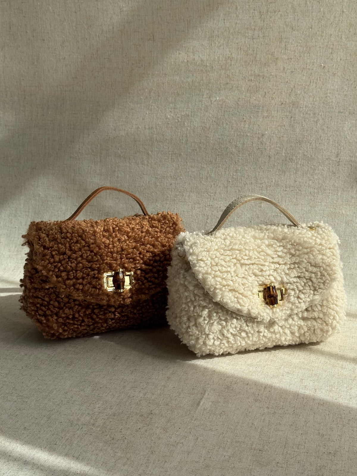 Borsa Lily - teddy, con tracolla in catena